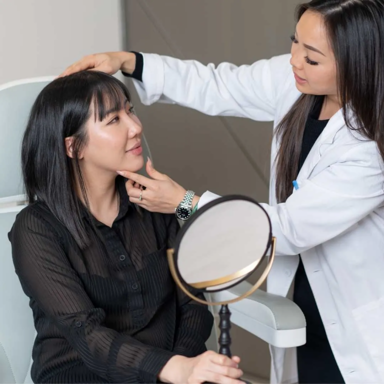 nurse injector giving a patient a consultation